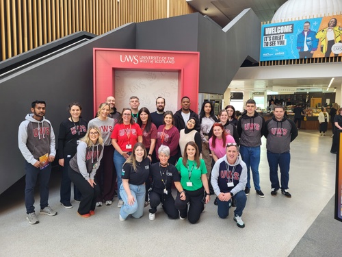 Paisley Autumn Open Day UWS Staff Team picture in UWS Paisley Campus Atrium