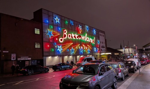 Exterior shot of the Barrowland Ballroom neon sign lit up at night