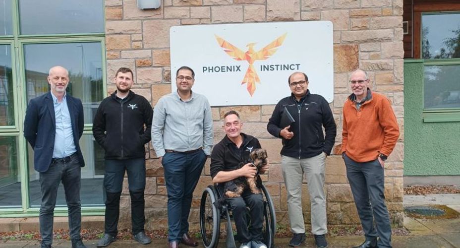 The Phoenix Instinct team standing outside the building